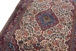 Backside of handmade New Bijar rug showing knot structure and weave density