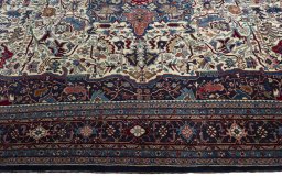 Corner detail of 1970s Bijar rug showing border pattern and Wool pile