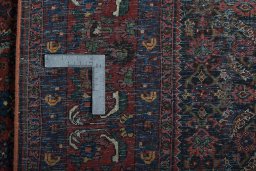 Surface texture of 1930s Bijar rug with natural Wool and intricate pattern