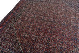 Backside of handmade 1930s Bijar rug showing knot structure and weave density