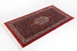 Corner detail of New Bijar rug showing border pattern and Wool pile