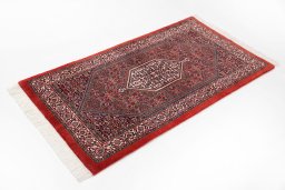 Close-up detail of New Bijar rug from Iran / Persia showing Wool weave