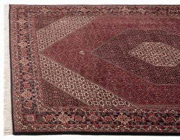 Corner detail of New Bijar rug showing border pattern and Wool pile