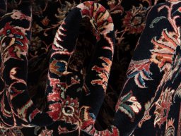 Backside of handmade New Bijar rug showing knot structure and weave density
