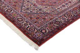 Backside of handmade New Bijar rug showing knot structure and weave density