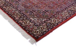 Backside of handmade New Bijar rug showing knot structure and weave density