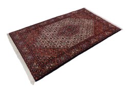 Corner detail of New Bijar rug showing border pattern and Wool pile