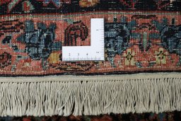 Close-up detail of 1920s Bijar rug from Iran / Persia showing Wool weave