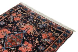 Surface texture of 1920s Bijar rug with natural Wool and intricate pattern