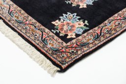 Backside of handmade New Bijar rug showing knot structure and weave density
