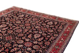 Surface texture of 2020s Bijar rug with natural Wool and intricate pattern