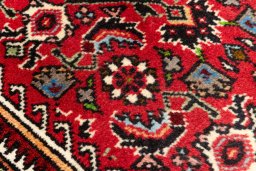 Surface texture of 2020s Bijar rug with natural Wool and intricate pattern