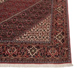 Backside of handmade New Bijar rug showing knot structure and weave density