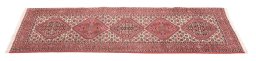 Backside of handmade New Bijar rug showing knot structure and weave density