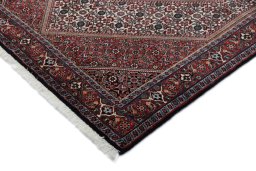 Backside of handmade New Bijar rug showing knot structure and weave density