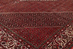 Backside of handmade New Bijar rug showing knot structure and weave density