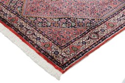 Backside of handmade New Bijar rug showing knot structure and weave density