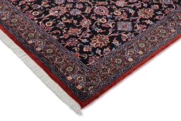 Backside of handmade New Bijar rug showing knot structure and weave density