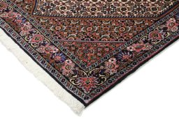 Backside of handmade New Bijar rug showing knot structure and weave density