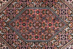 Close-up detail of New Bijar rug from Iran / Persia showing Wool weave