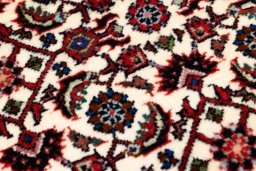 Backside of handmade New Bijar rug showing knot structure and weave density