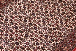 Backside of handmade New Bijar rug showing knot structure and weave density