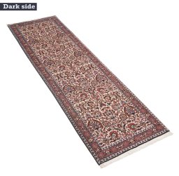 Backside of handmade New Bijar rug showing knot structure and weave density