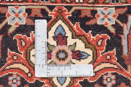 Backside of handmade New Bijar rug showing knot structure and weave density