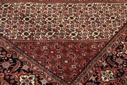 Backside of handmade New Bijar rug showing knot structure and weave density