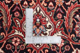 Backside of handmade New Bijar rug showing knot structure and weave density