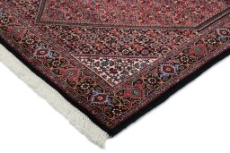 Close-up detail of New Bijar rug from Iran / Persia showing Wool weave