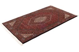 Close-up detail of New Bijar rug from Iran / Persia showing Wool weave