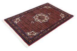Corner detail of New Bijar rug showing border pattern and Wool pile