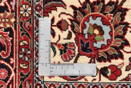Backside of handmade New Bijar rug showing knot structure and weave density
