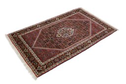 Corner detail of New Bijar rug showing border pattern and Wool pile