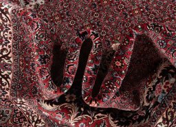 Corner detail of New Bijar rug showing border pattern and Wool pile