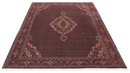 Backside of handmade New Bijar rug showing knot structure and weave density
