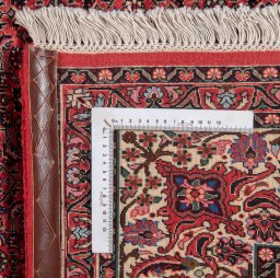 Backside of handmade New Bijar rug showing knot structure and weave density