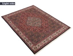 Backside of handmade 1990s Bijar rug showing knot structure and weave density