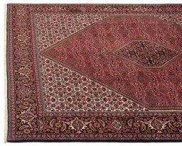 Corner detail of New Bijar rug showing border pattern and Wool pile