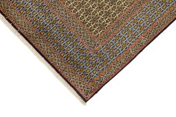 Backside of handmade 1960s Ghom rug showing knot structure and weave density