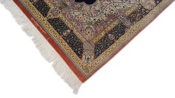 Backside of handmade New Ghom rug showing knot structure and weave density