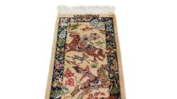Surface texture of New Ghom rug with natural Silk and intricate pattern