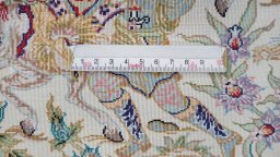 Corner detail of New Ghom rug showing border pattern and Silk pile
