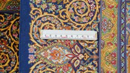 Corner detail of New Ghom rug showing border pattern and Silk pile