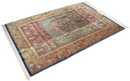 Corner detail of New Ghom rug showing border pattern and Silk pile