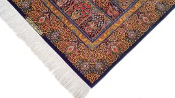 Central medallion detail of New Ghom rug from Iran / Persia