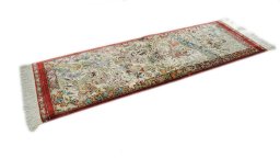 Corner detail of New Ghom rug showing border pattern and Silk pile