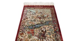 Surface texture of New Ghom rug with natural Silk and intricate pattern