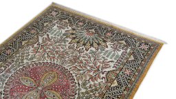 Surface texture of 1970s Ghom rug with natural Wool and intricate pattern